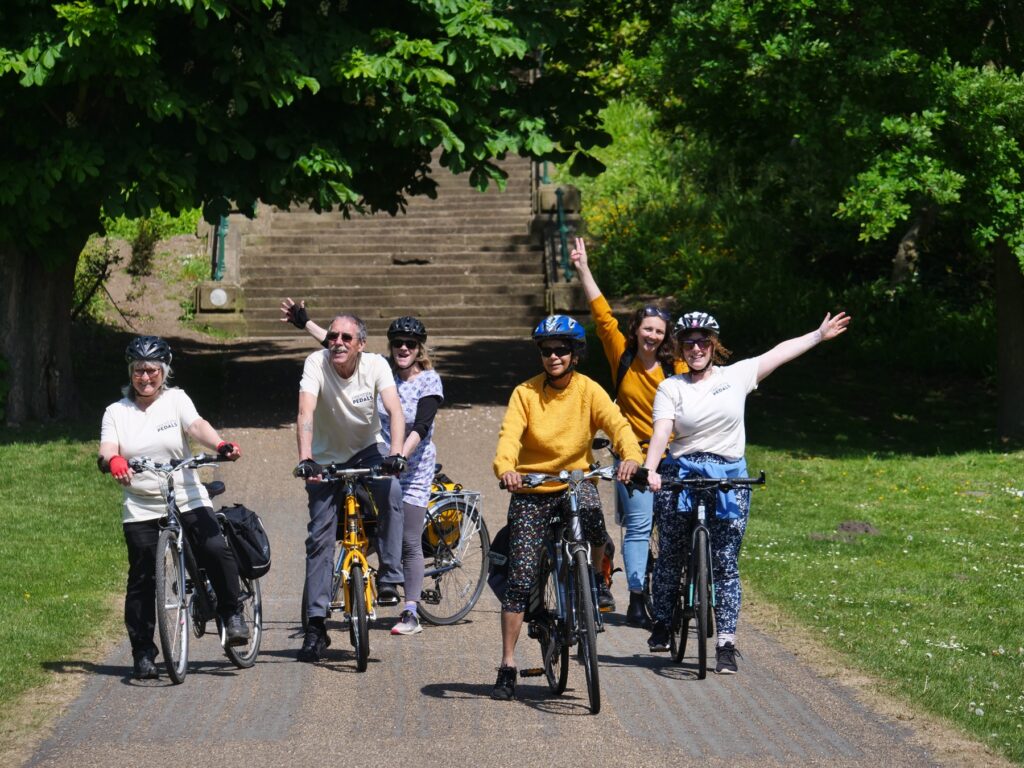 Bibiane cycling with group